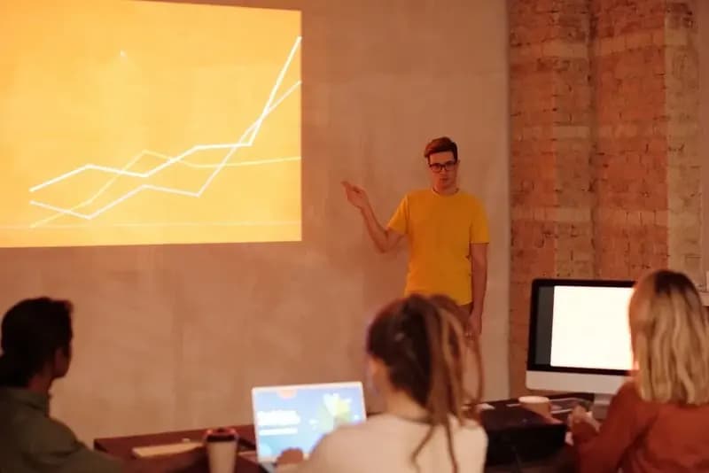 Student presenting a growth chart to classmates